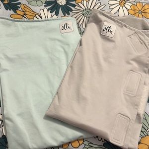 Two Ollie world swaddles gray and blue/green and two laundry bags